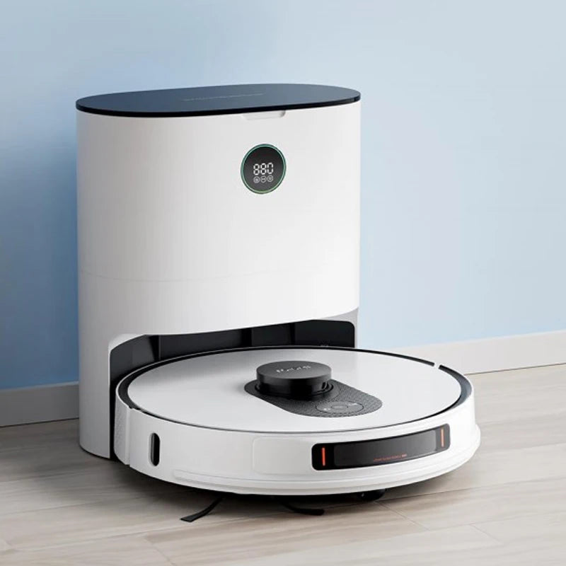 Lamp Post robot vacuum and mop cleaner with vibration mopping, shown on the floor near its cleaning base.