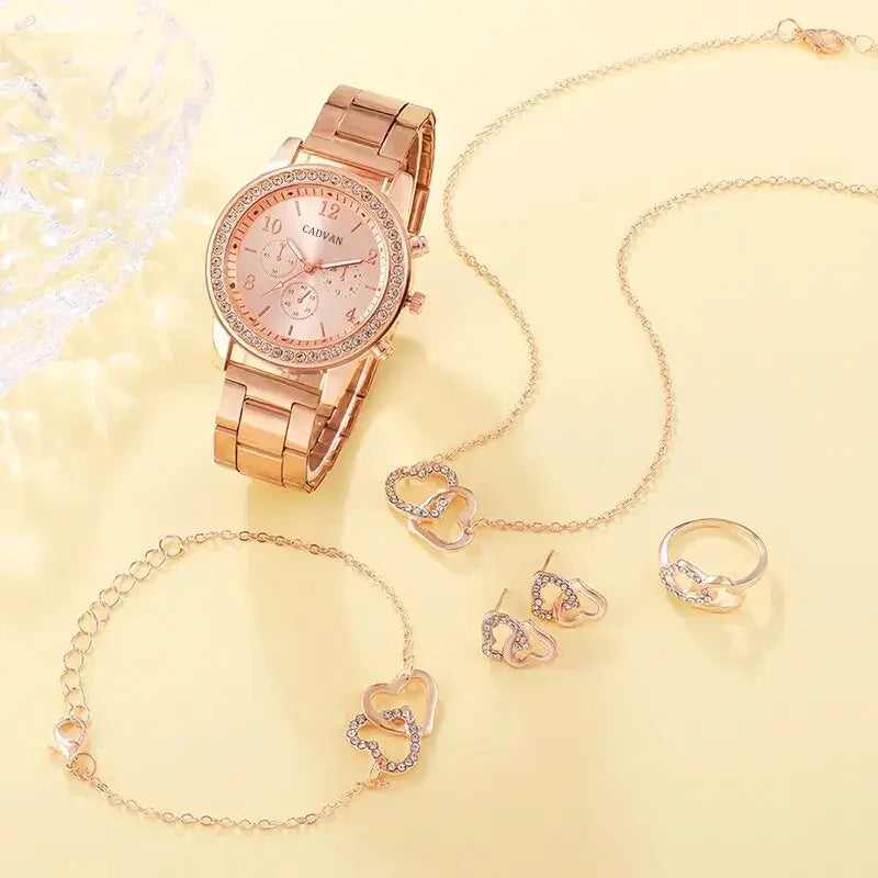 Rose gold luxury watch set for women by Lamp Post featuring a stylish round dial and matching bracelet.