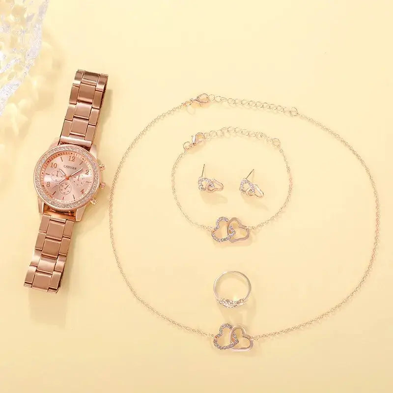Rose gold luxury watch set for women by Lamp Post, featuring a stylish rose gold watch and matching accessories.