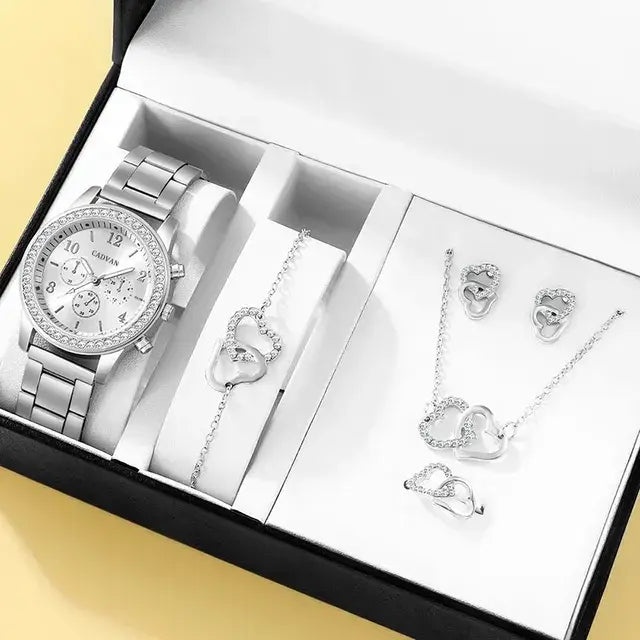 Rose gold luxury watch set for women by Lamp Post, featuring a stylish rose gold watch and matching accessories.
