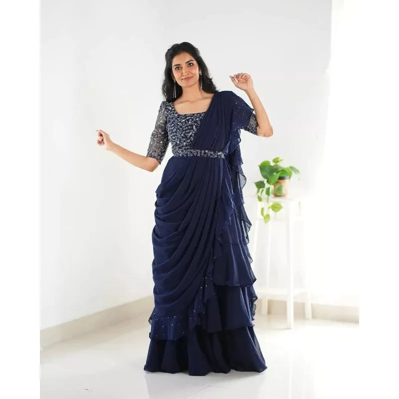 Elegant Indian Pakistani wedding designer sari by Lamp Post displayed with intricate embroidery and vibrant colors.