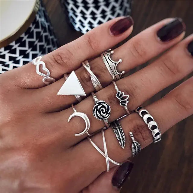 Silver women rings set by Lamp Post featuring ten stylish rings with various designs, perfect for stacking or everyday wear.