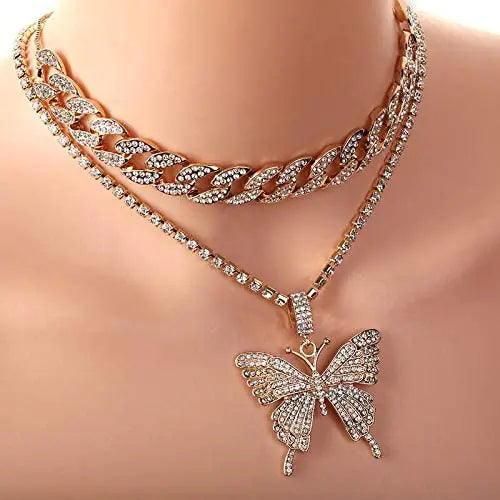 Silver women charm necklace set by Lamp Post featuring layered chains and delicate charm pendants.