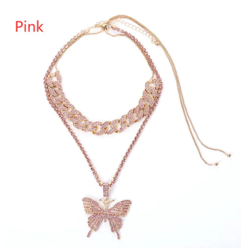 Silver women charm necklace set by Lamp Post featuring layered chains and delicate charm pendants.