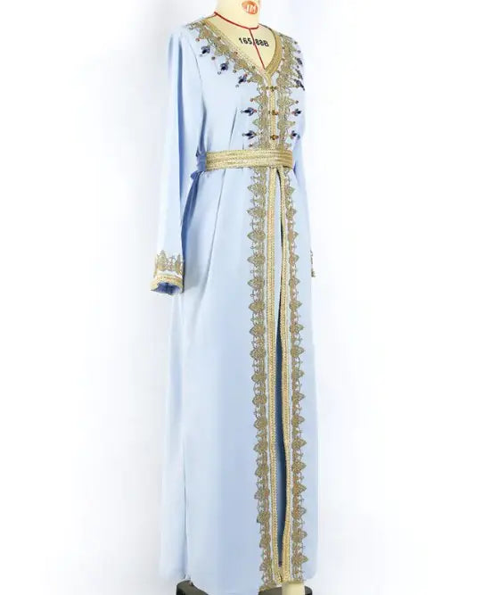 Luxurious beads kaftan dress by Lamp Post featuring intricate beadwork and flowing fabric in a stylish, elegant design.
