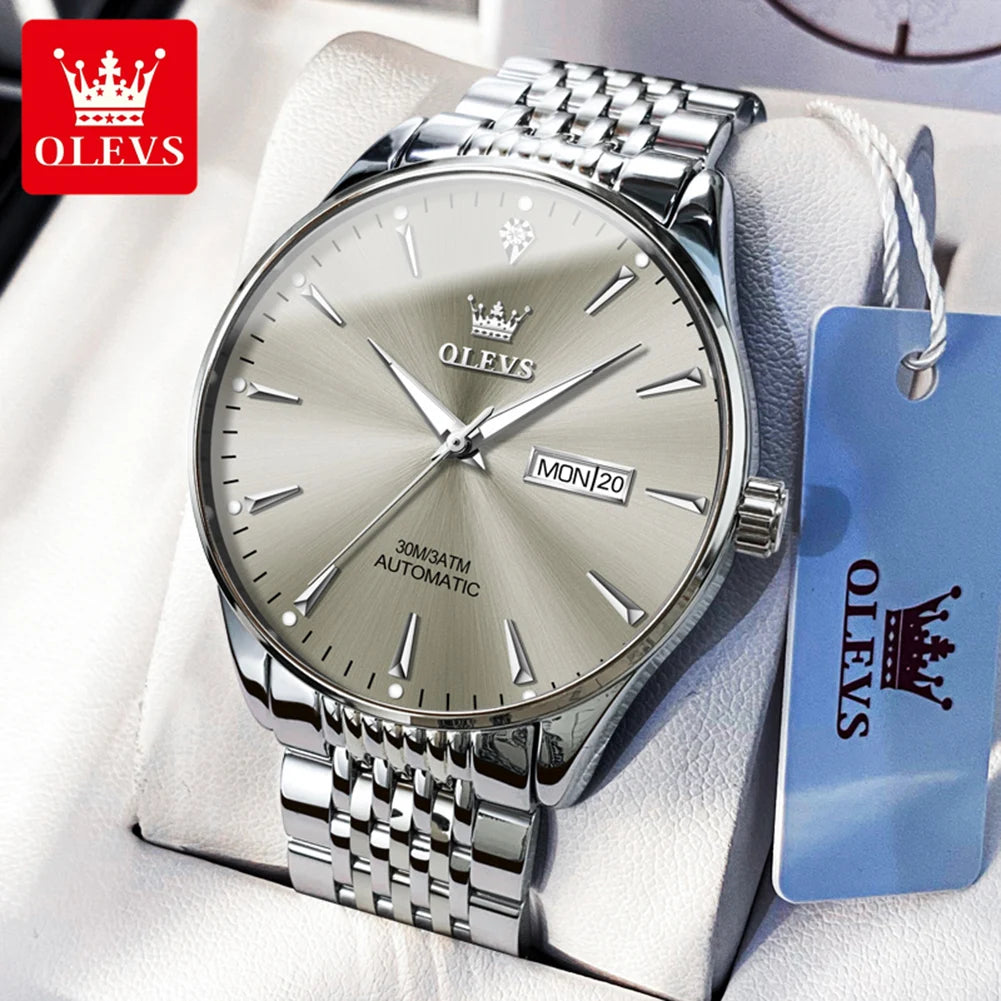 Gold and white men's wristwatch by Lamp Post with luminous dial, stainless steel strap, date display, waterproof, automatic mechanical design.
