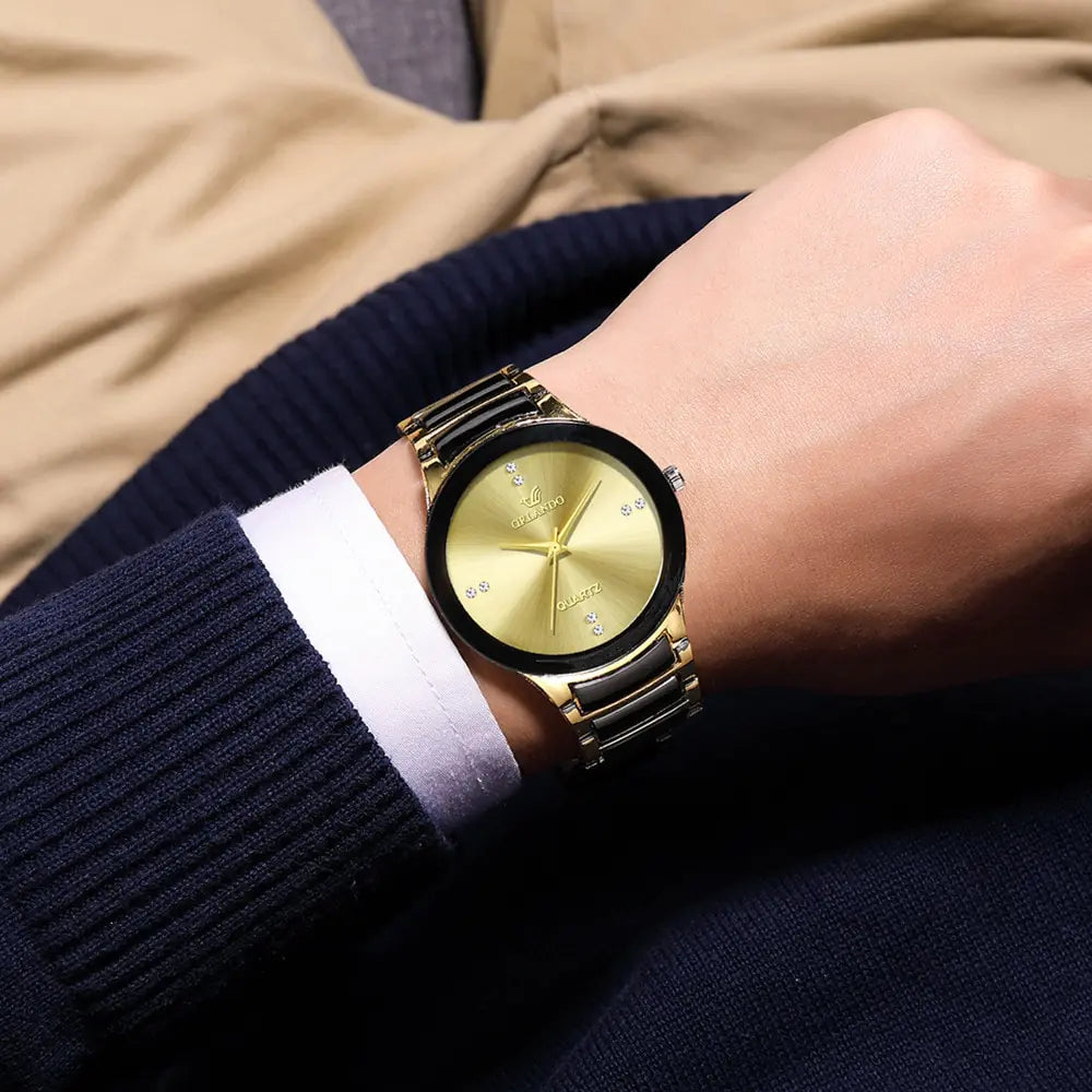 Gold men's stainless steel quartz watch by Lamp Post featuring a sleek, modern design and a durable metal strap.