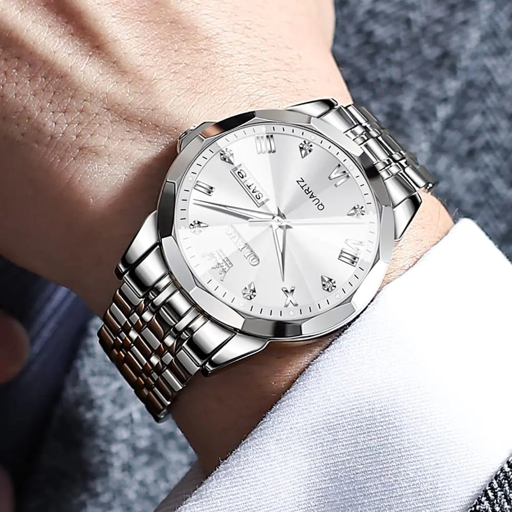Silver men’s luxury wristwatch by Lamp Post with diamond accents, analog quartz, stainless steel band, luminous dial, and waterproof design.