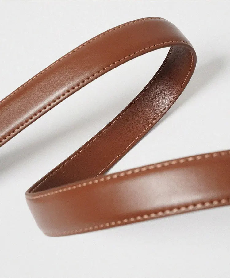 Elegant women's letter buckle belt by Lamp Post featuring premium textured leather and modern style, displayed on a white background.