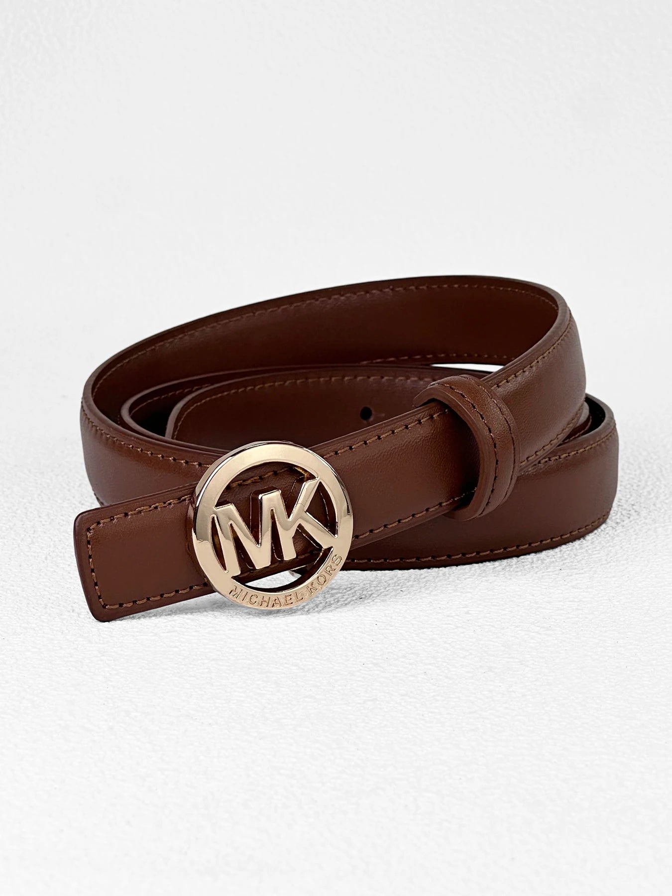 Elegant women's leather belt with a letter buckle, featuring premium texture and modern style by Lamp Post.