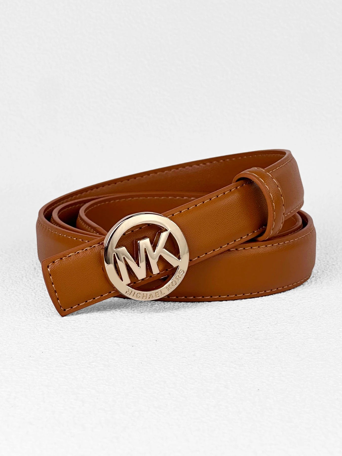 Elegant women's letter buckle belt by Lamp Post featuring premium textured leather and modern style, displayed on a white background.