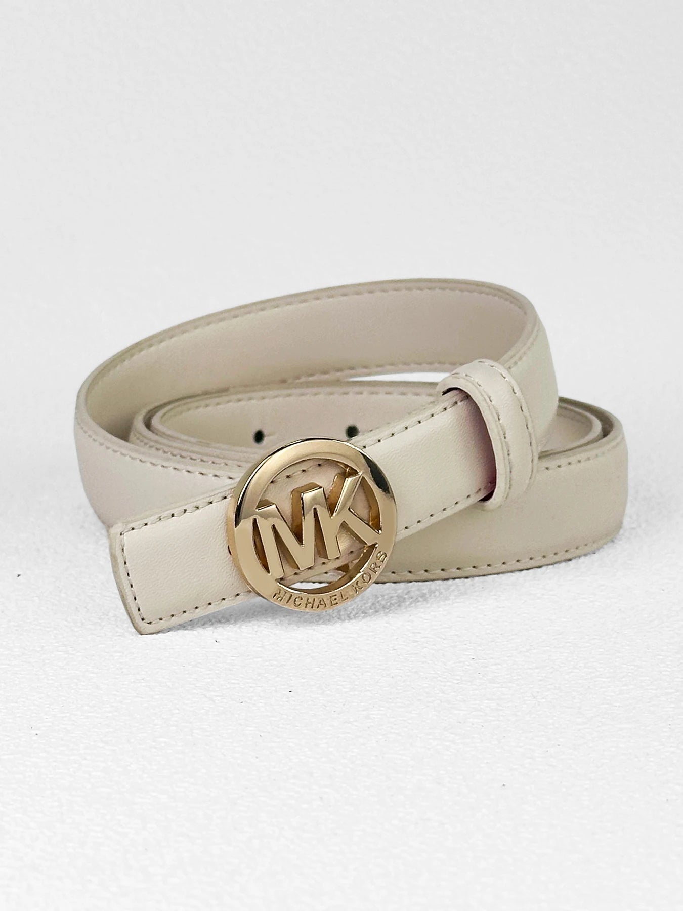 White women's leather belt with letter buckle from Lamp Post, featuring premium textured finish and modern style design.