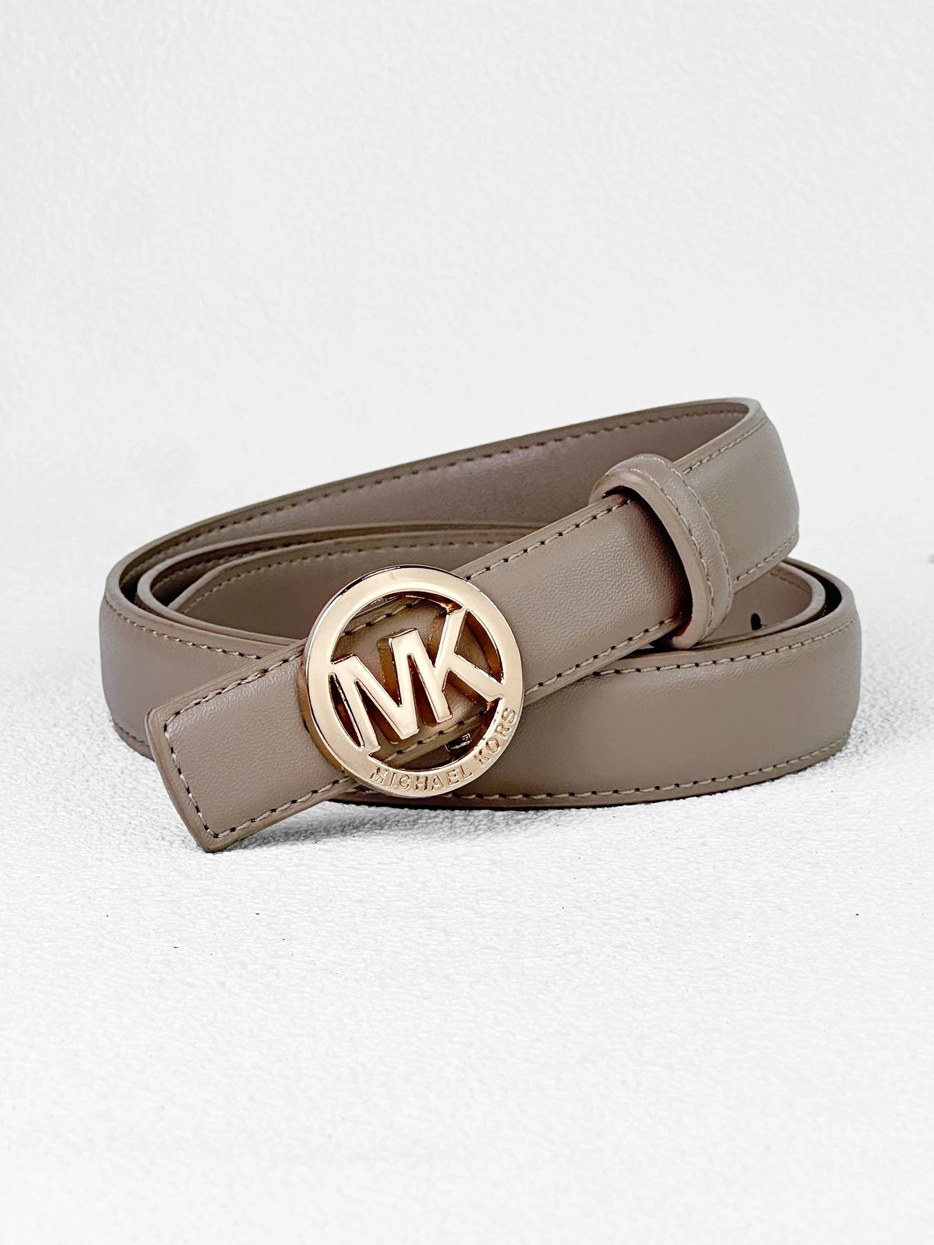 Elegant women's letter buckle belt by Lamp Post, featuring premium textured material and modern style for fashionable outfits.