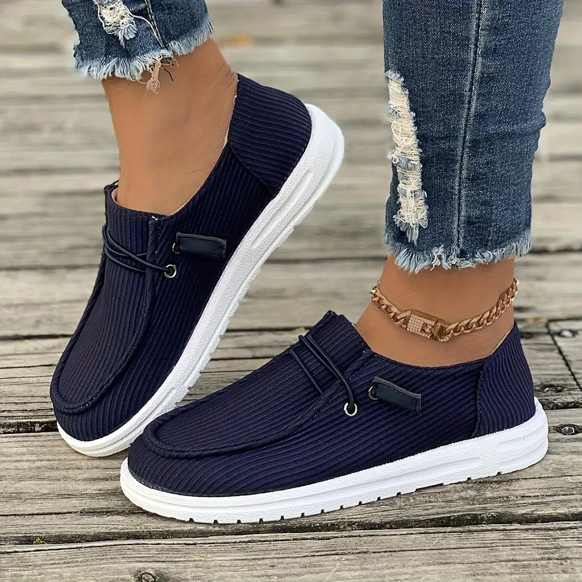 White non-slip women's sneakers by Lamp Post, featuring comfortable design and durable soles for everyday wear.