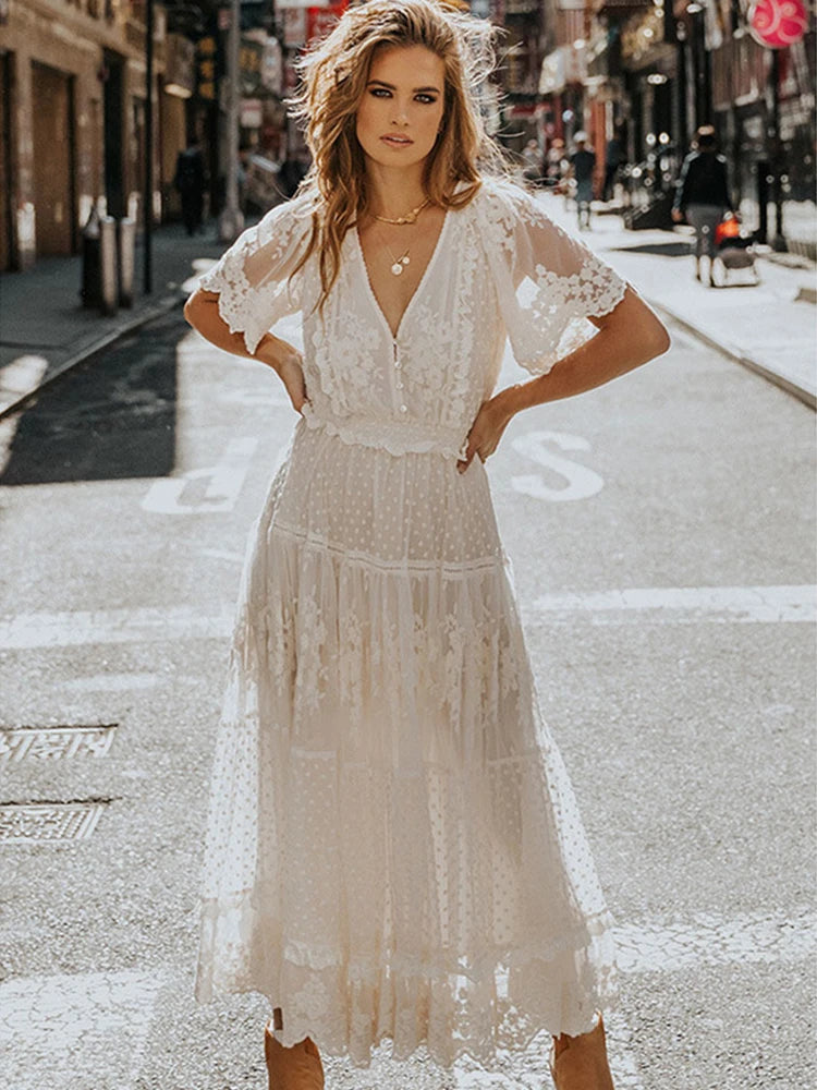 White women's long dress by Lamp Post featuring a flowing design and elegant fit, perfect for formal or casual occasions.