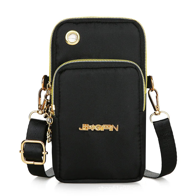 Black Lamp Post women's crossbody mini bag with coin pocket, phone compartment, and neck strap, suitable for running and daily use.