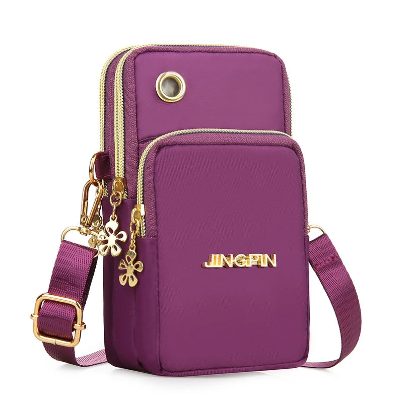 Black women's mini crossbody phone bag by Lamp Post, 20cm long, with coin pocket, neck hanging design, perfect for running and casual wear.