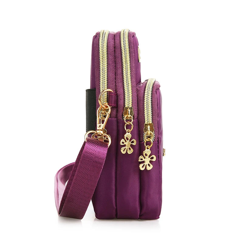 Black women's crossbody mini bag by Lamp Post, 20cm phone bag with coin pocket, ideal for moms, running, and casual wear.