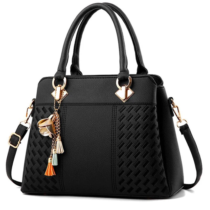Black luxury women's crossbody handbag by Lamp Post, stylish and compact with a sleek design and adjustable strap.
