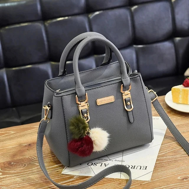 Black luxury women’s crossbody handbag by Lamp Post, stylish and spacious with a sleek design, perfect for daily use.