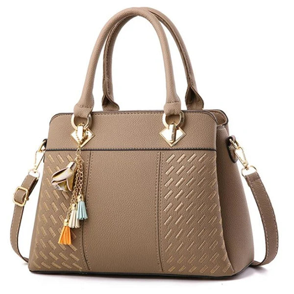 Black luxury women's crossbody handbag by Lamp Post, stylish leather bag with a sleek design and adjustable strap.