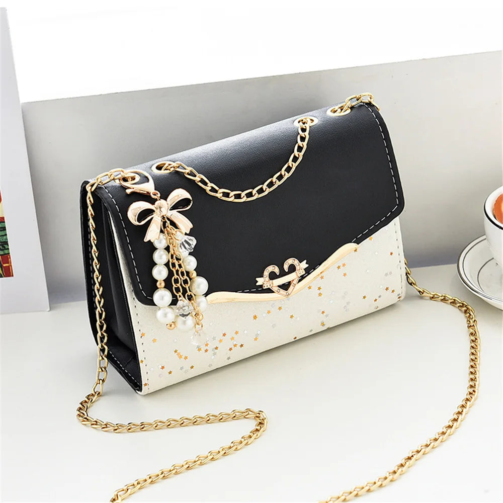 Black trendy women's shoulder bag by Lamp Post, stylish and practical women bag with a sleek design for everyday use.