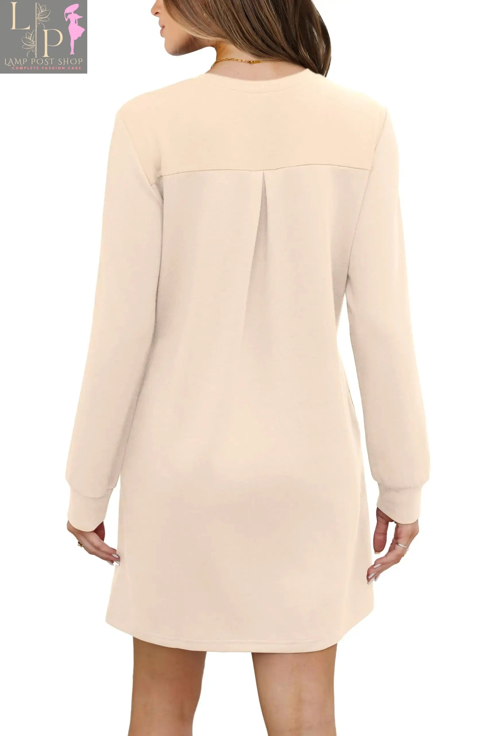 Light apricot long sleeve women’s party dress by Lamp Post, stylish and elegant for special occasions.