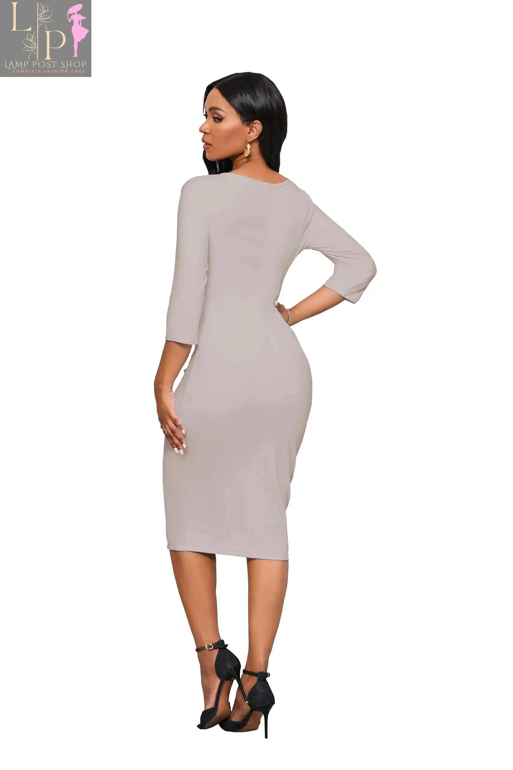 Apricot medium-length women’s dress by Lamp Post, suitable for church, featuring elegant and comfortable style for ladies.