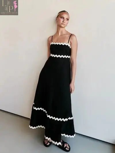 Black Benny Maxi Dress for women by Lamp Post, lightweight summer dress with flowing fabric and sleeveless design.