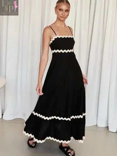 Black Benny Maxi Dress for women by Lamp Post, lightweight summer dress with flowing fabric and sleeveless design.