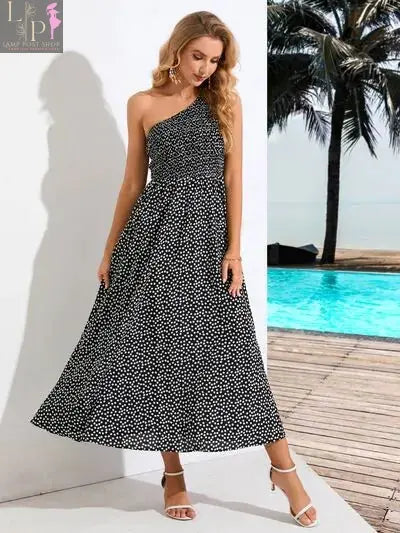 Black Zoe single shoulder women’s dress by Lamp Post, stylish and elegant with a fitted silhouette and single shoulder strap.
