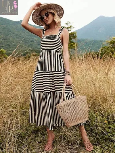 Black and white striped Murry Tiered Dress by Lamp Post for women, featuring a flowy, layered design perfect for casual or dressy occasions.