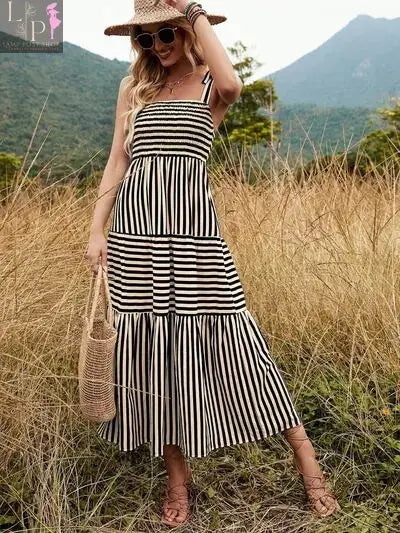 Black and white striped Murry tiered women's dress by Lamp Post, featuring a flowing, layered design perfect for casual wear.
