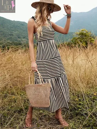 Black and white striped Murry tiered dress for women by Lamp Post, featuring a flowy, layered design perfect for casual or dressy occasions.