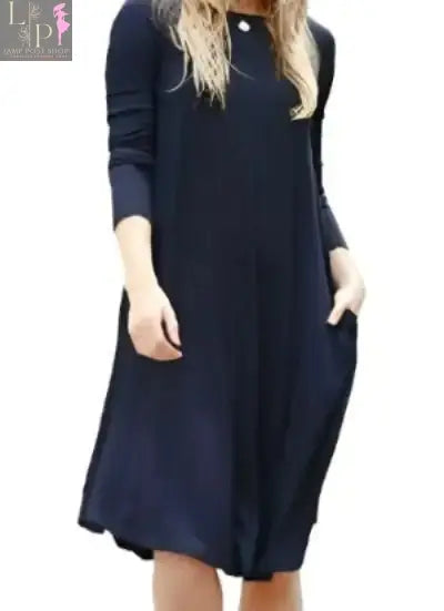 Dark blue women’s side-pocket dress by Lamp Post featuring a stylish, fitted silhouette and elegant design.