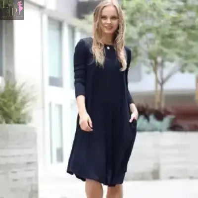 Dark blue women's side-pocket dress by Lamp Post, featuring a sexy signature style and a flattering fit.