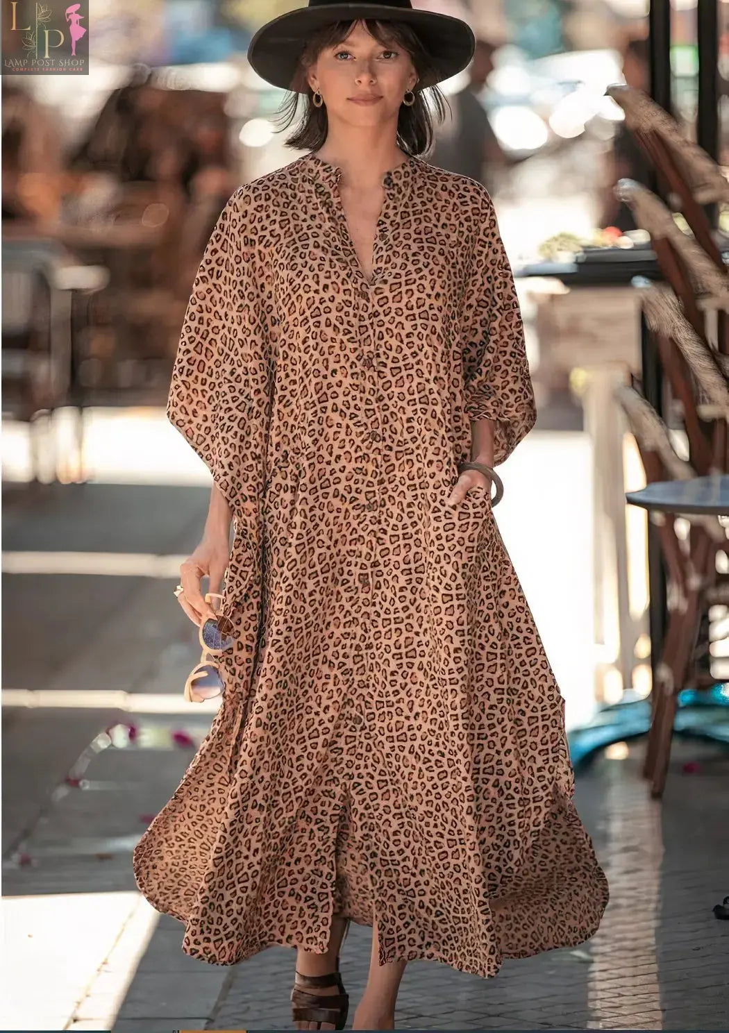 Women’s wide dress by Lamp Post with cheetah print, featuring a flowing fit and stylish animal pattern.