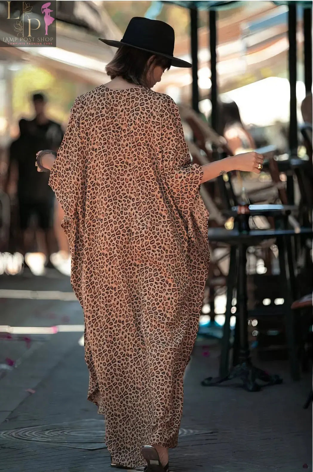 Women’s wide cheetah print dress by Lamp Post, featuring a relaxed fit and stylish animal pattern.