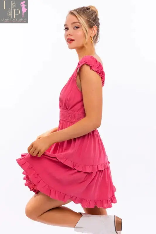 Pink cap sleeve ruffle mini dress for women by Lamp Post, featuring a feminine and stylish design perfect for warm-weather wear.