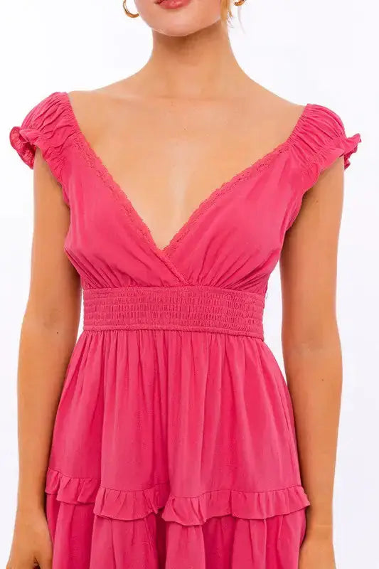 Pink Lamp Post women's cap sleeve ruffle mini dress with a fitted bodice and flared skirt, perfect for casual or summer wear.