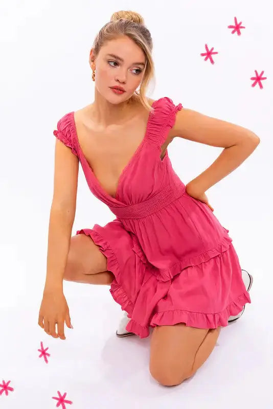 Pink Lamp Post women’s cap sleeve ruffle mini dress with a fitted bodice and flared skirt, perfect for casual summer wear.