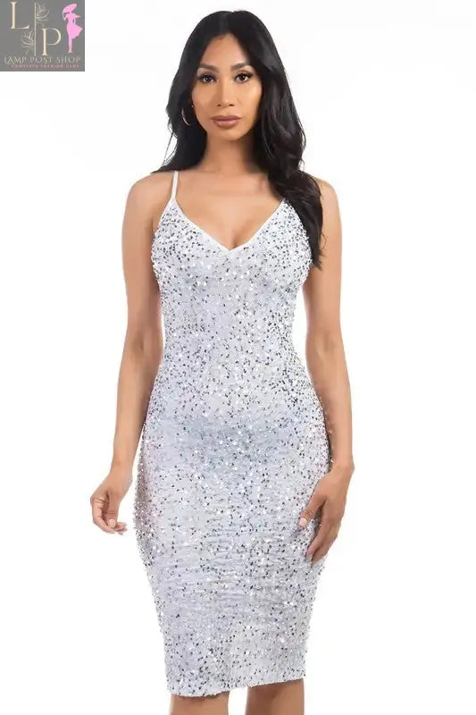 White women's sequin party dress by Lamp Post featuring a fitted silhouette and sparkling sequin embellishments.