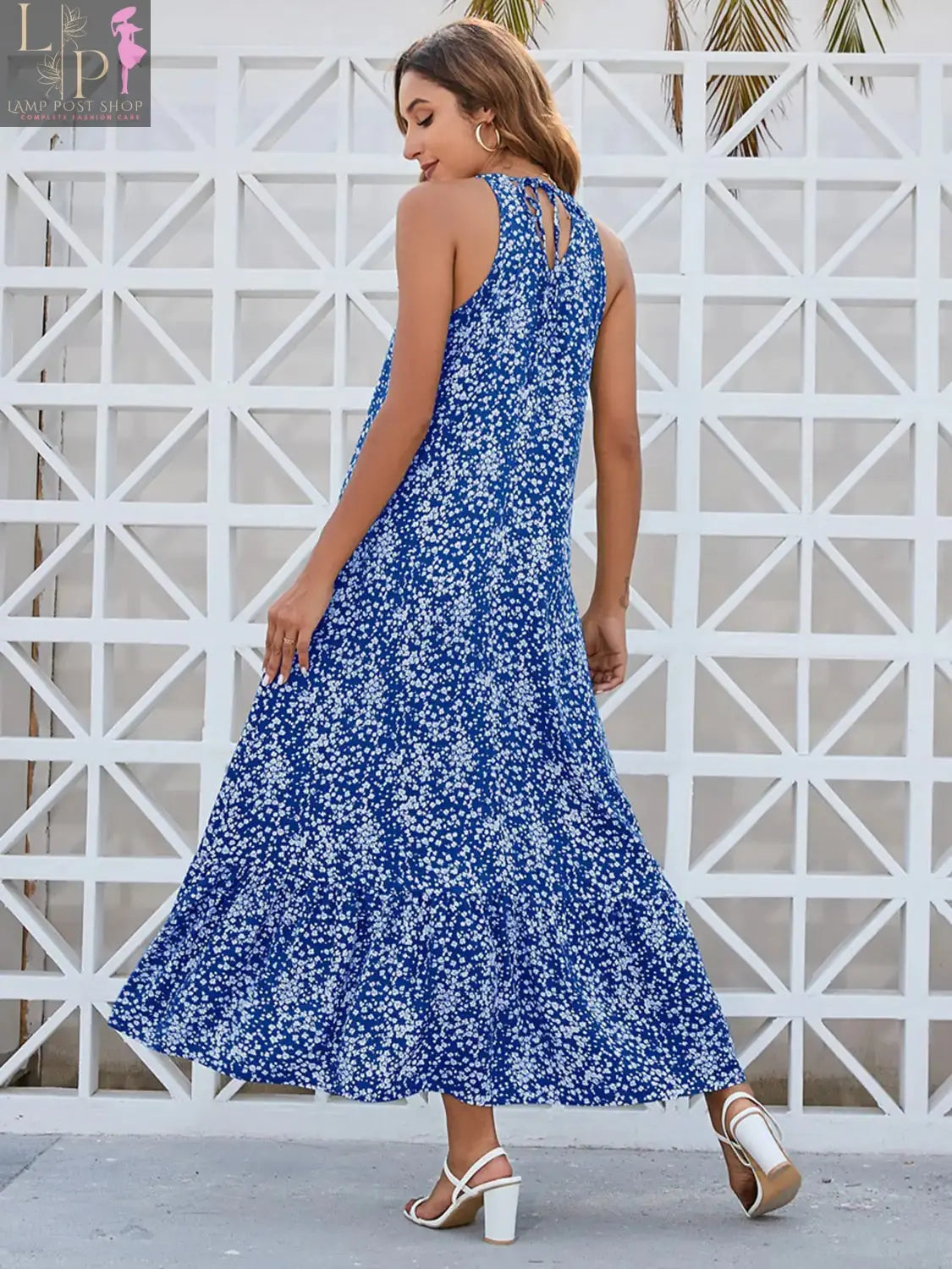 Sage green Lamp Post women's Ditsy Dress with a feminine floral pattern and flowy fabric, perfect for casual or summer wear.