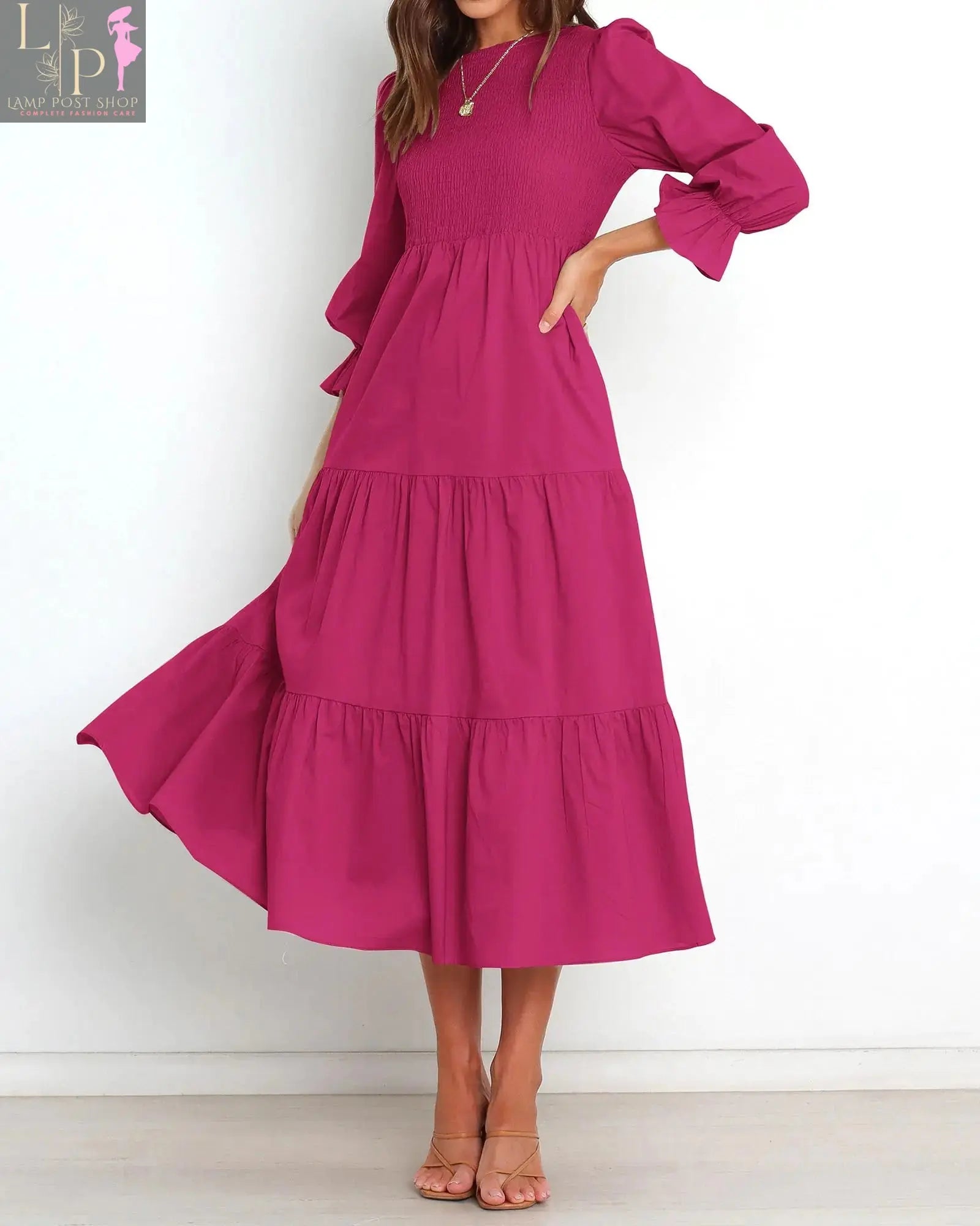 Pink boho maxi dress with long sleeves for women by Lamp Post, flowing fabric and relaxed fit perfect for casual wear.