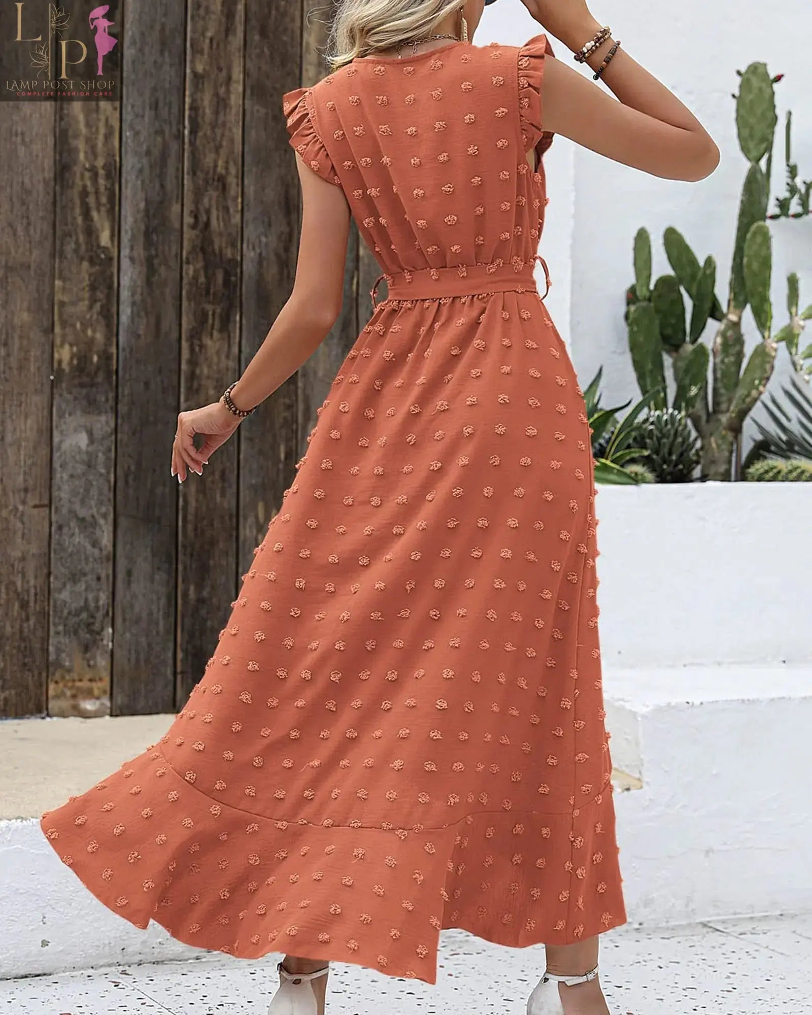 Women’s 2024 summer V-neck dress by Lamp Post in orange-red Swiss dot fabric, lightweight and stylish for warm weather.