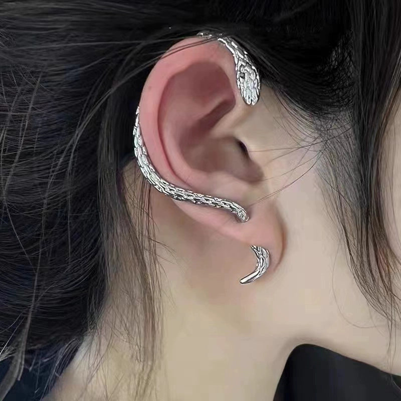 Snake shape women ear hanging earrings by Lamp Post, featuring a spirit snake design with ear holes for versatile wear.