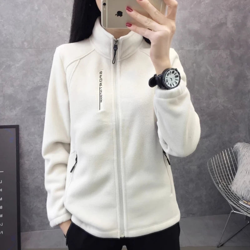 Beige women's winter running jacket and sweatshirt coat by Lamp Post, designed for warmth and outdoor activity.