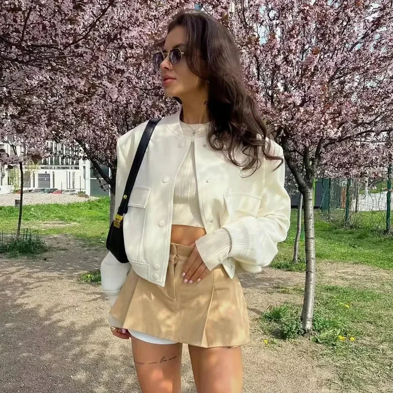 Beige women's bomber jacket by Lamp Post featuring long sleeves and a cropped design, perfect as stylish outerwear.