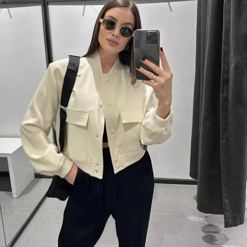 Beige women's long sleeve crop bomber jacket by Lamp Post, lightweight outerwear with a stylish, fitted design.