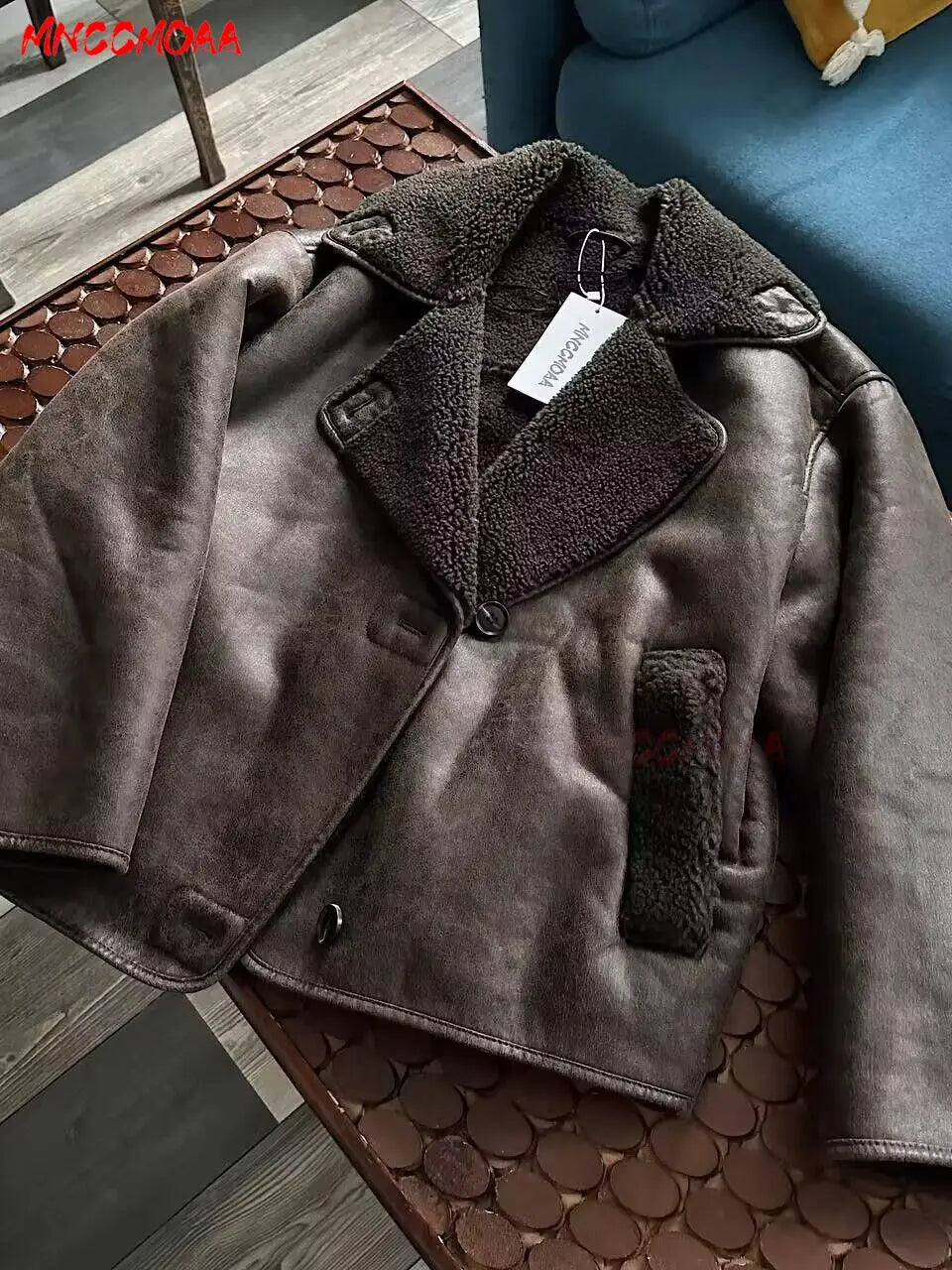 Women’s long sleeve brown jacket by Lamp Post featuring a casual solid design, pockets, and outwear style.